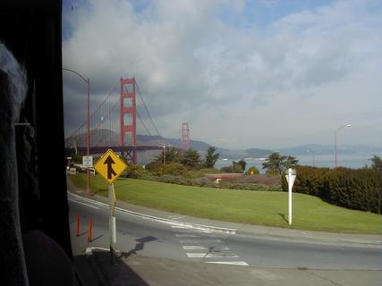 Golden Gate Bridge from the tour bus<br>Location: <a href="https://www.google.com/maps/search/?api=1&query=37.80674,-122.47476" target="_new">Highway 101</a>
